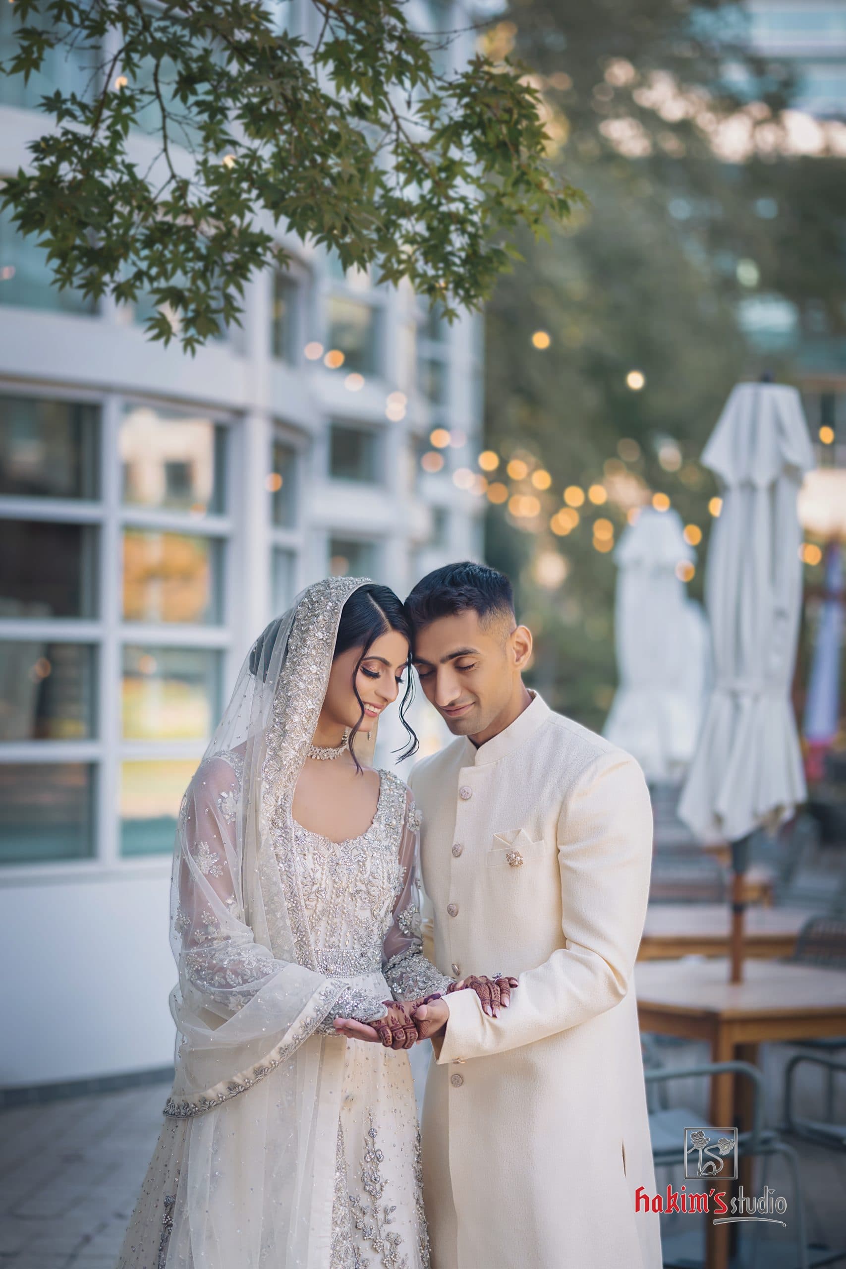 Arshi and Raihaan sharing a tender moment beneath the trees